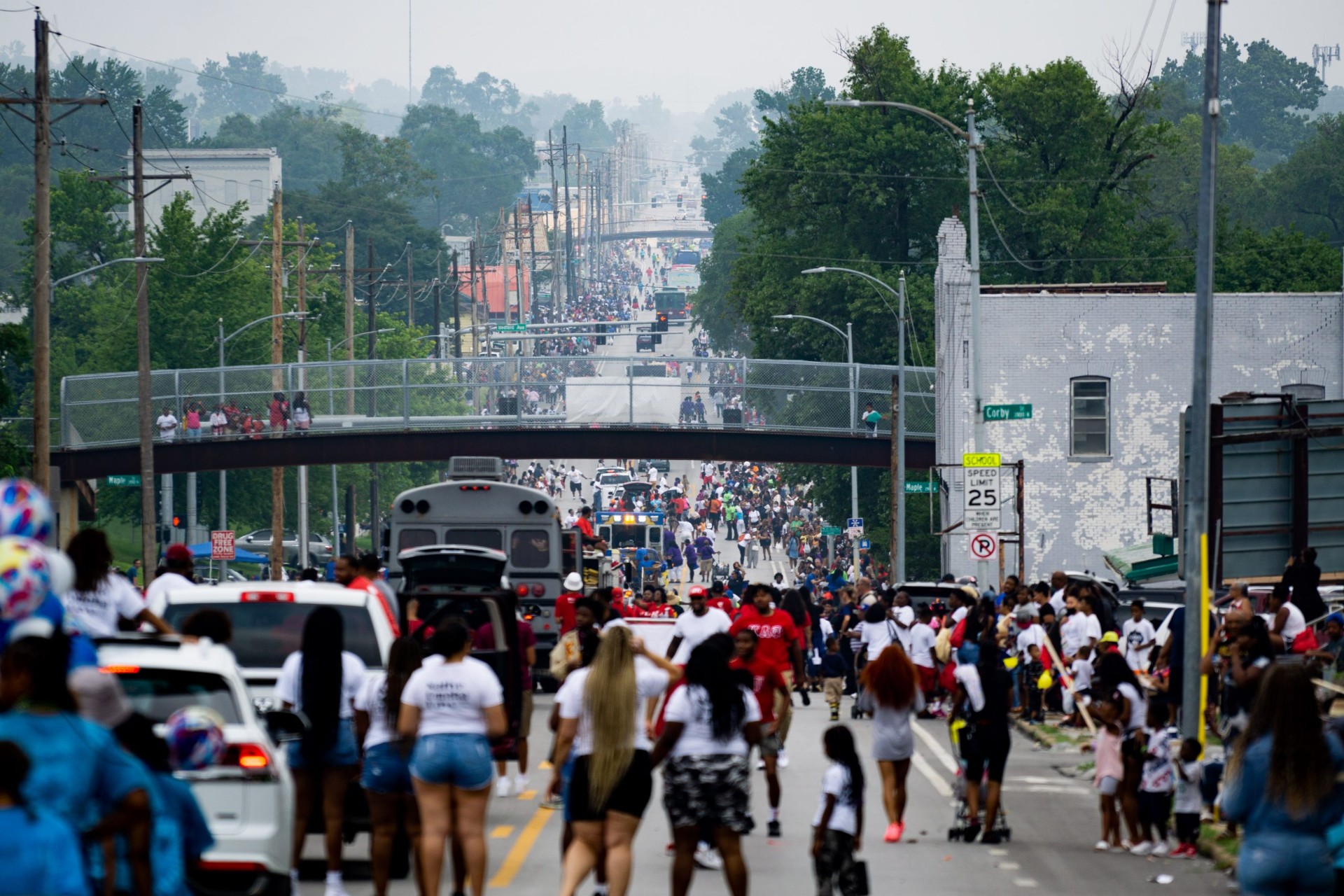 A crowded street during the Native Omaha Days parade